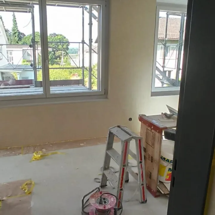 Innenputz an Wand und Fensterlaibungen