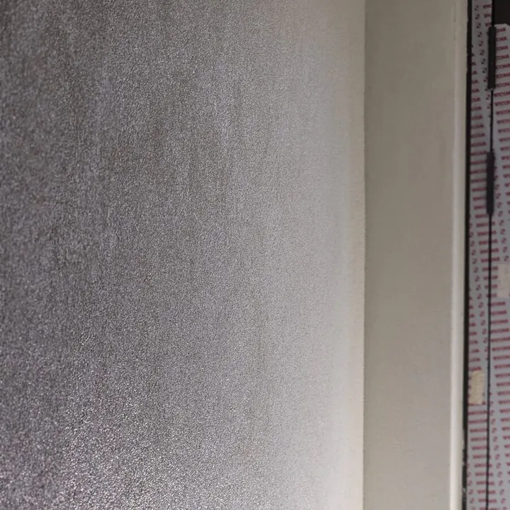 Detail einer strukturierten Putzoberfläche